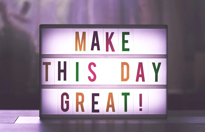 A light box that says make this day great