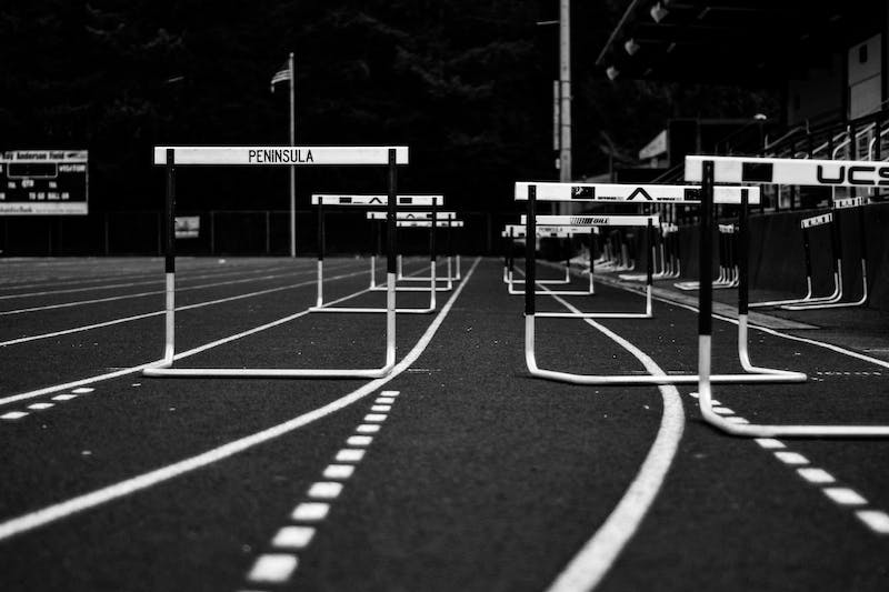 A black and white photo of an empty track.